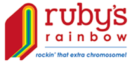 A red book spine with a rainbow pattern on the pages and text "ruby's rainbow rockin' that extra chromosome!".
