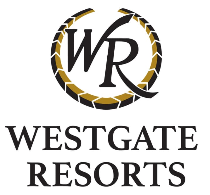 Black "WR" monogram inside a gold and black segmented circle with "WESTGATE RESORTS" below.