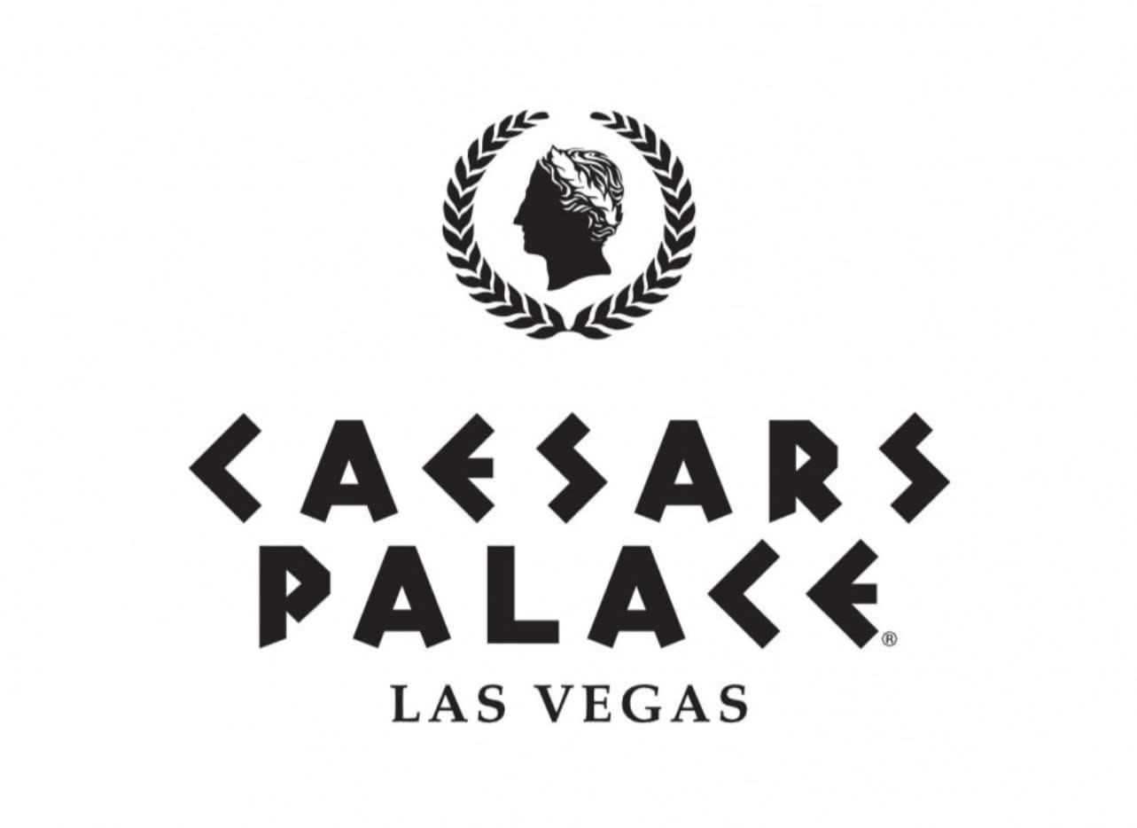 Black logo with a profile of Caesar's head in a wreath, above "CAESARS PALACE LAS VEGAS".