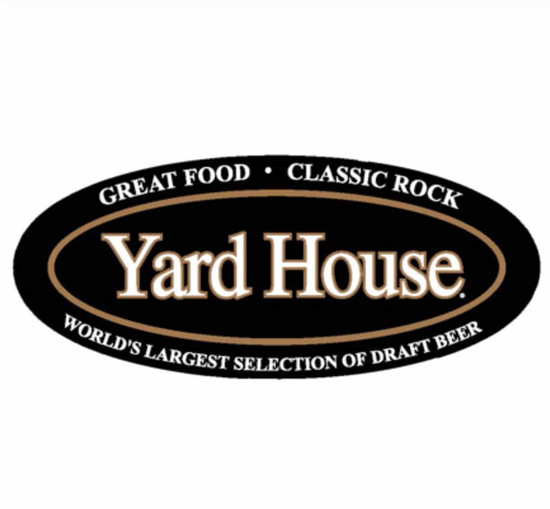Black oval logo with gold outline and white text: "GREAT FOOD • CLASSIC ROCK Yard House WORLD'S LARGEST SELECTION OF DRAFT BEER."